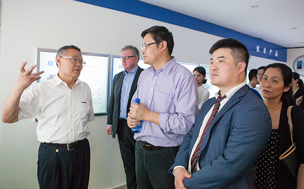 加拿大国聚会员谭耕一行来yp街机智能考察